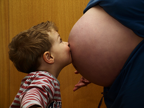 Older Brother Kissing Belly