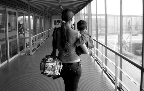 Woman Traveling with Baby